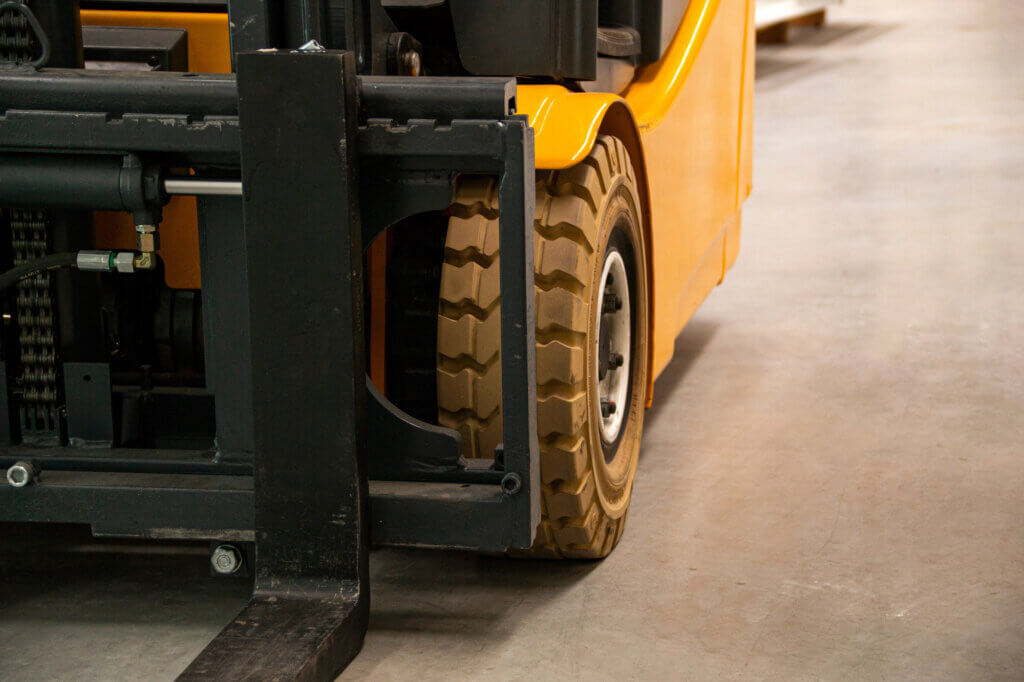 Forklift Checks - A Close View of a Forklift Wheel for Thorough Examination
